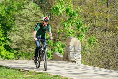 bike rider on Virginia Tech's campus in the summer 